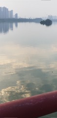 166329