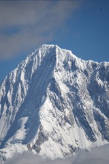 13857