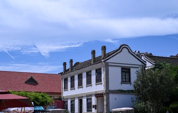166067