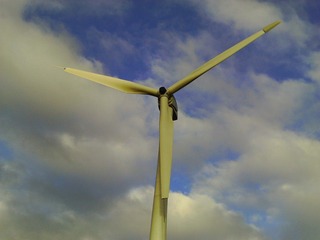 against the blue sky and white clouds