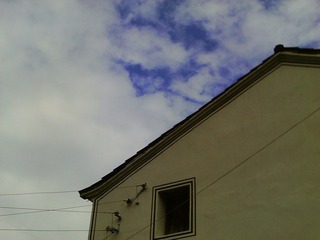 white wall against the blue sky