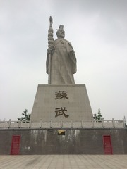 180386