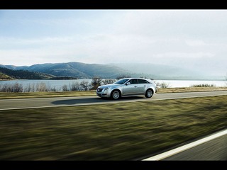 2013-Cadillac-CTS-Sport-Wagon-Motion-1920x1440.jpg