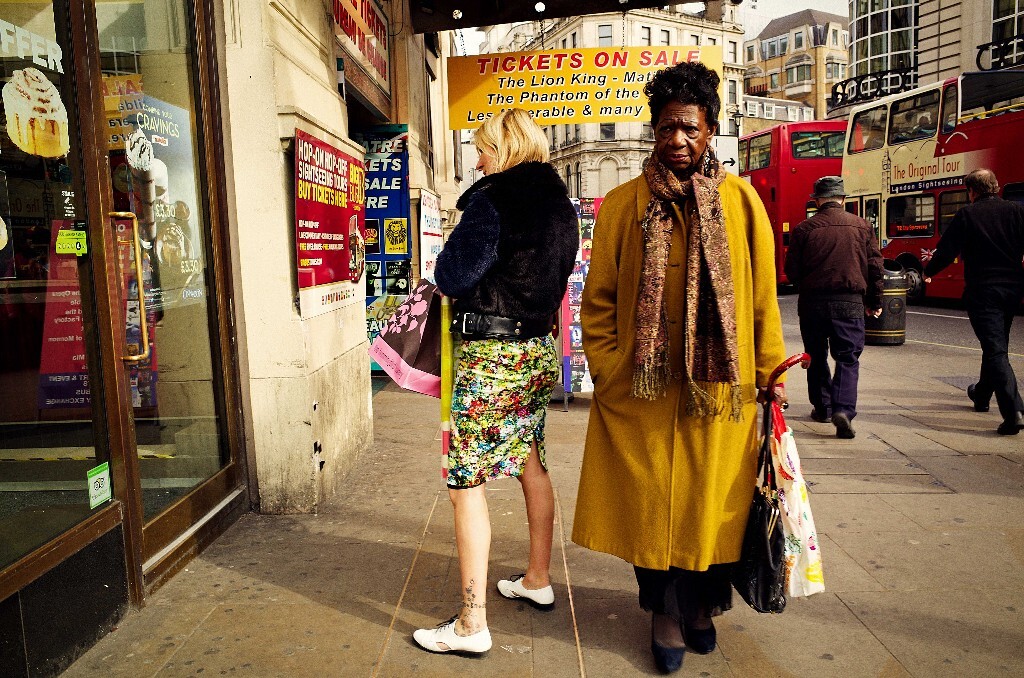 a blond lady and a black lady