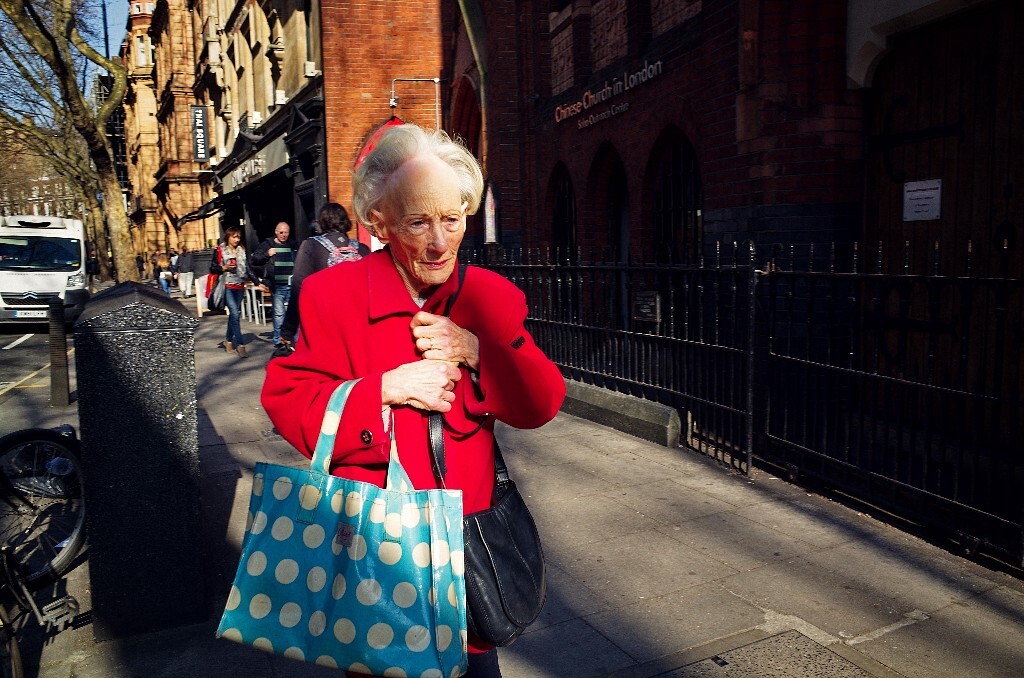 An old lady with receding hairline