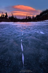Lenticular Clouds over Frozen Lake