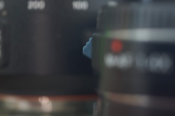 77693