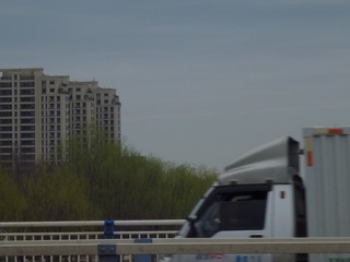 164034