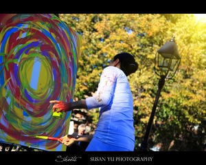 japanese painter is painting her " joy"