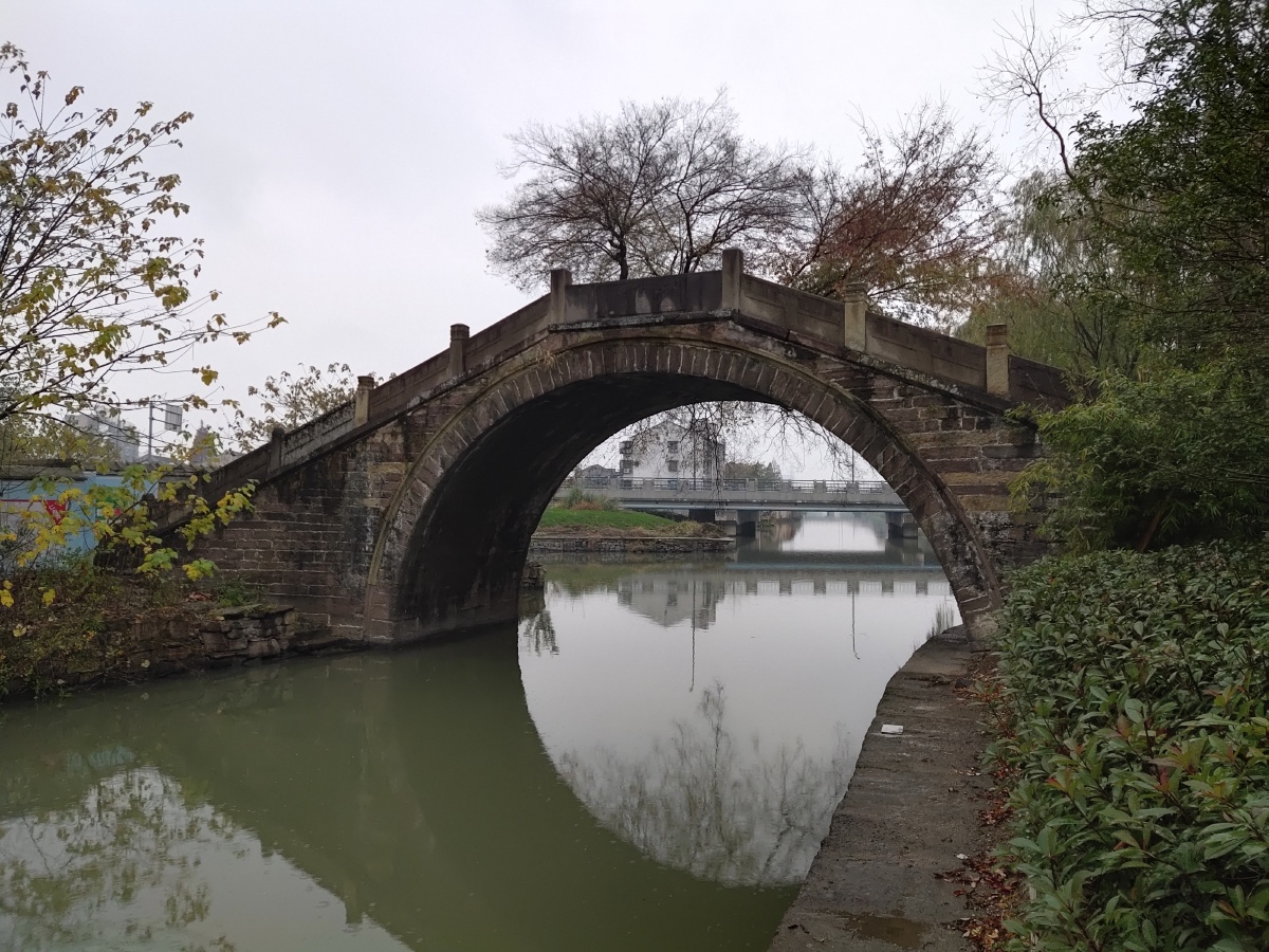 冬至盼春冬雨中的望春桥