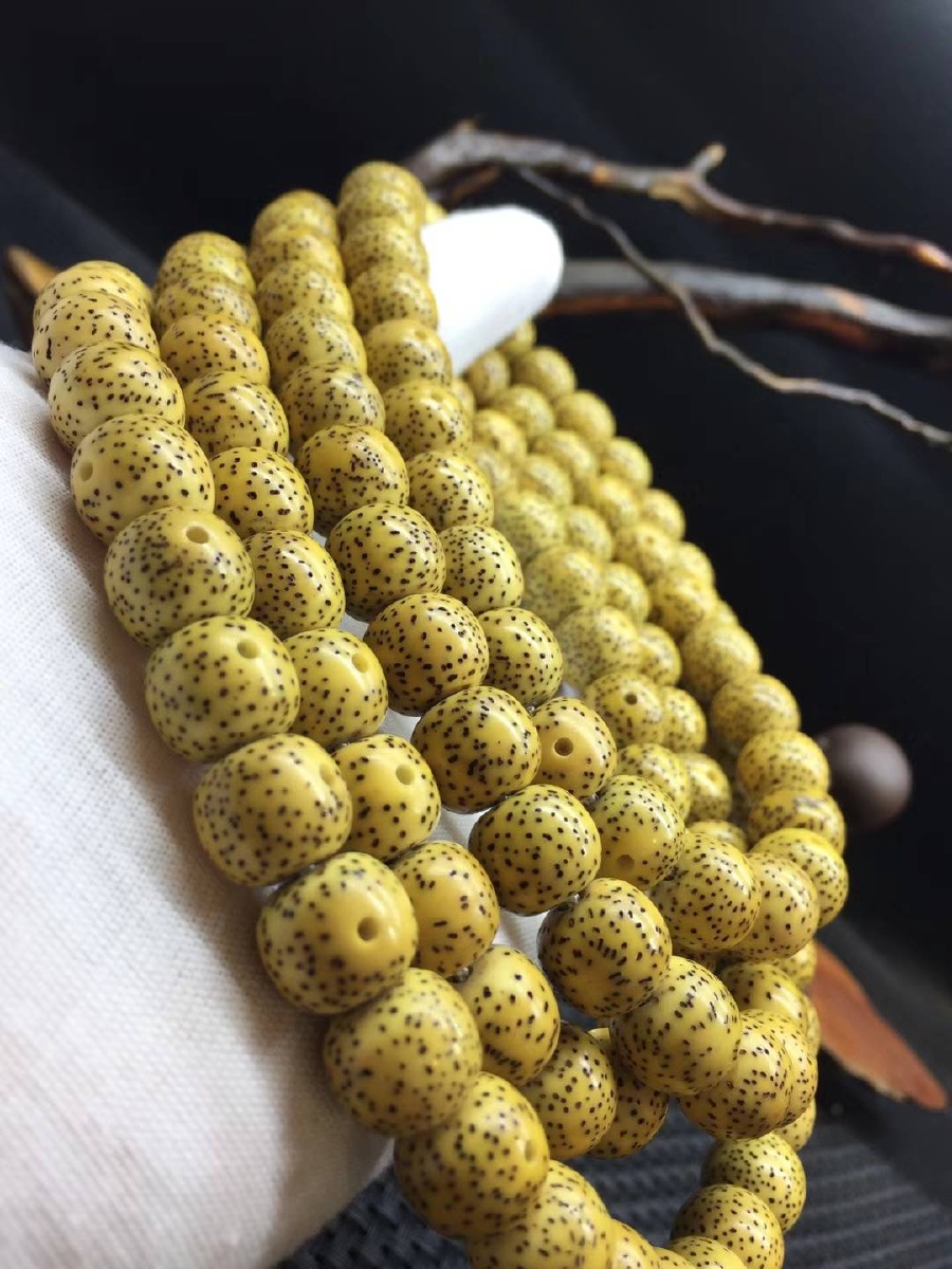 星月菩提原生态鸡油黄1011桶珠