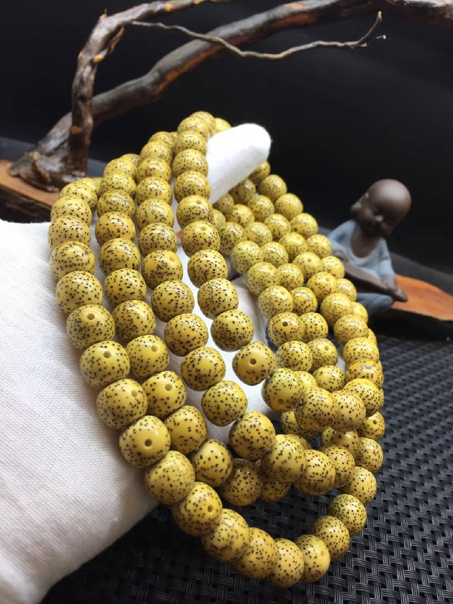 星月菩提原生态鸡油黄1011桶珠