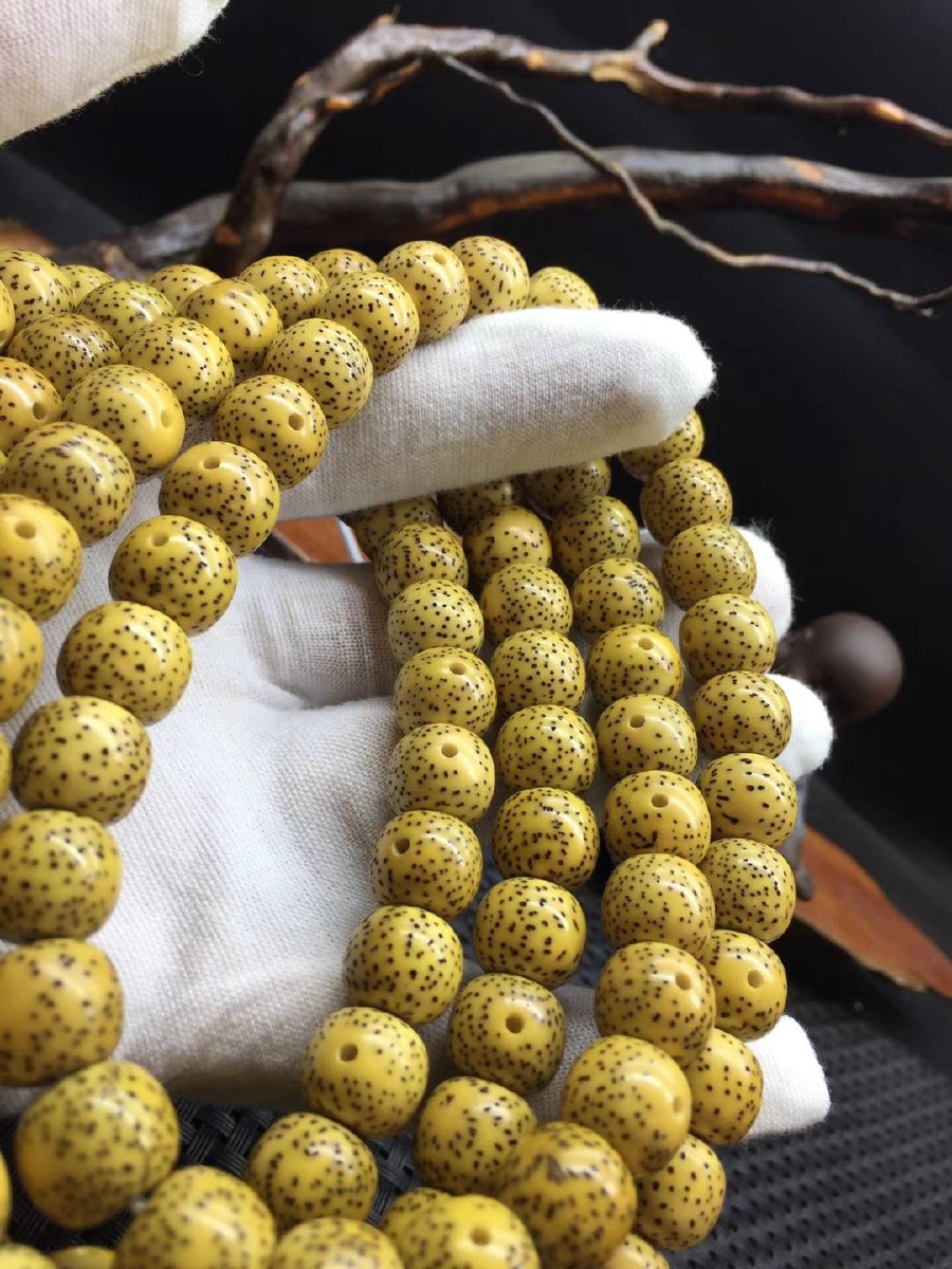 星月菩提原生态鸡油黄1011桶珠