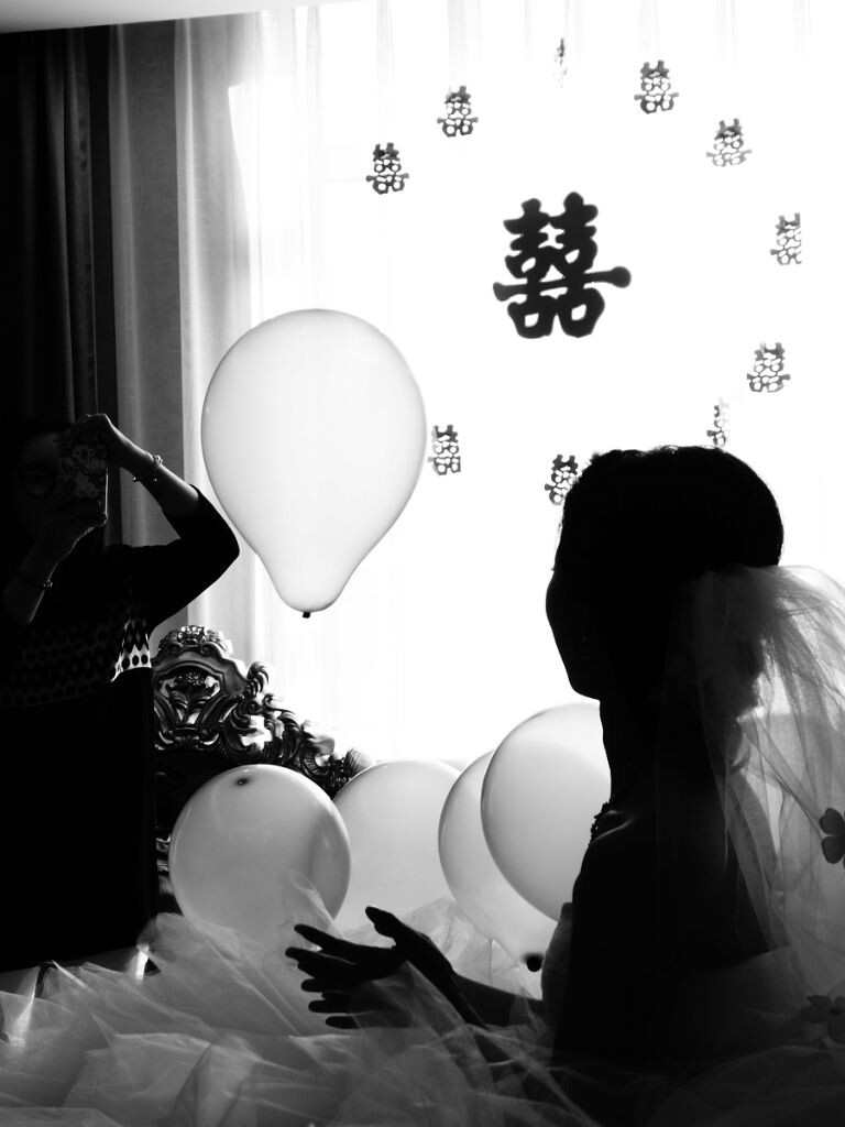 一个女人最幸福的时刻之一，便是身披白沙“囍”字当头的那一刻
