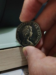 21437