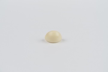 a garlic on white paper