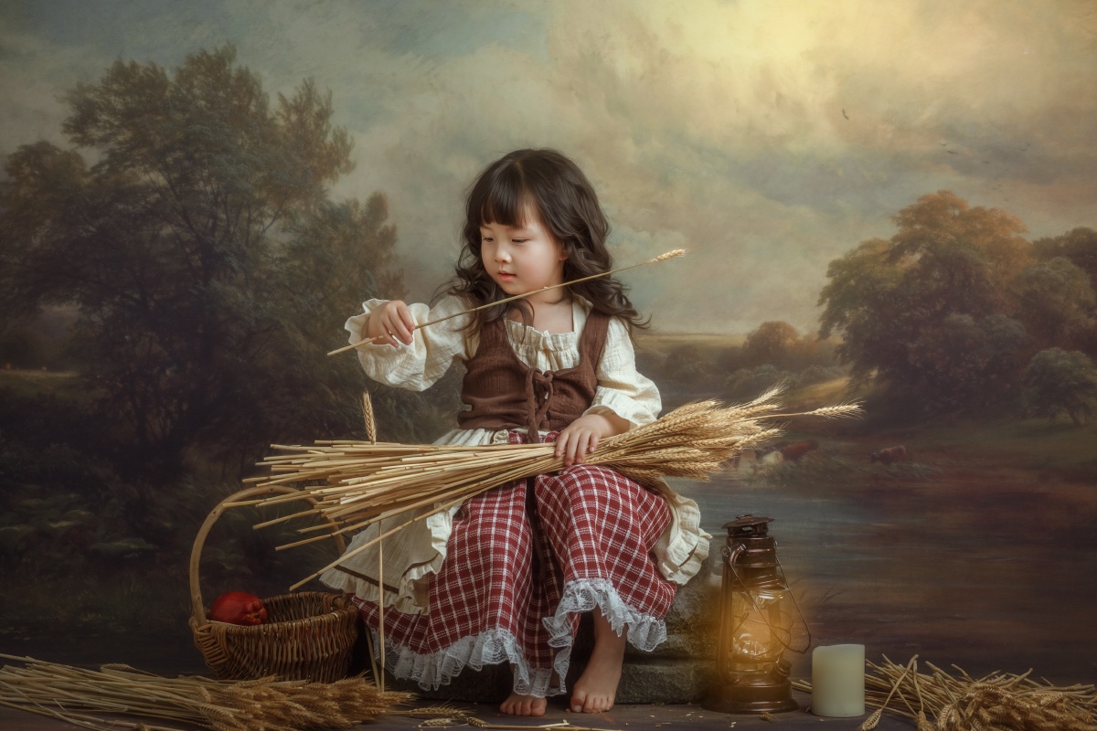拾麦穗的小女孩