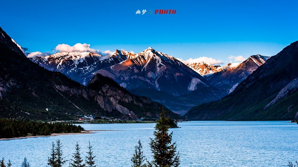 夕阳西下的雪山金顶是然乌湖最美的时刻
