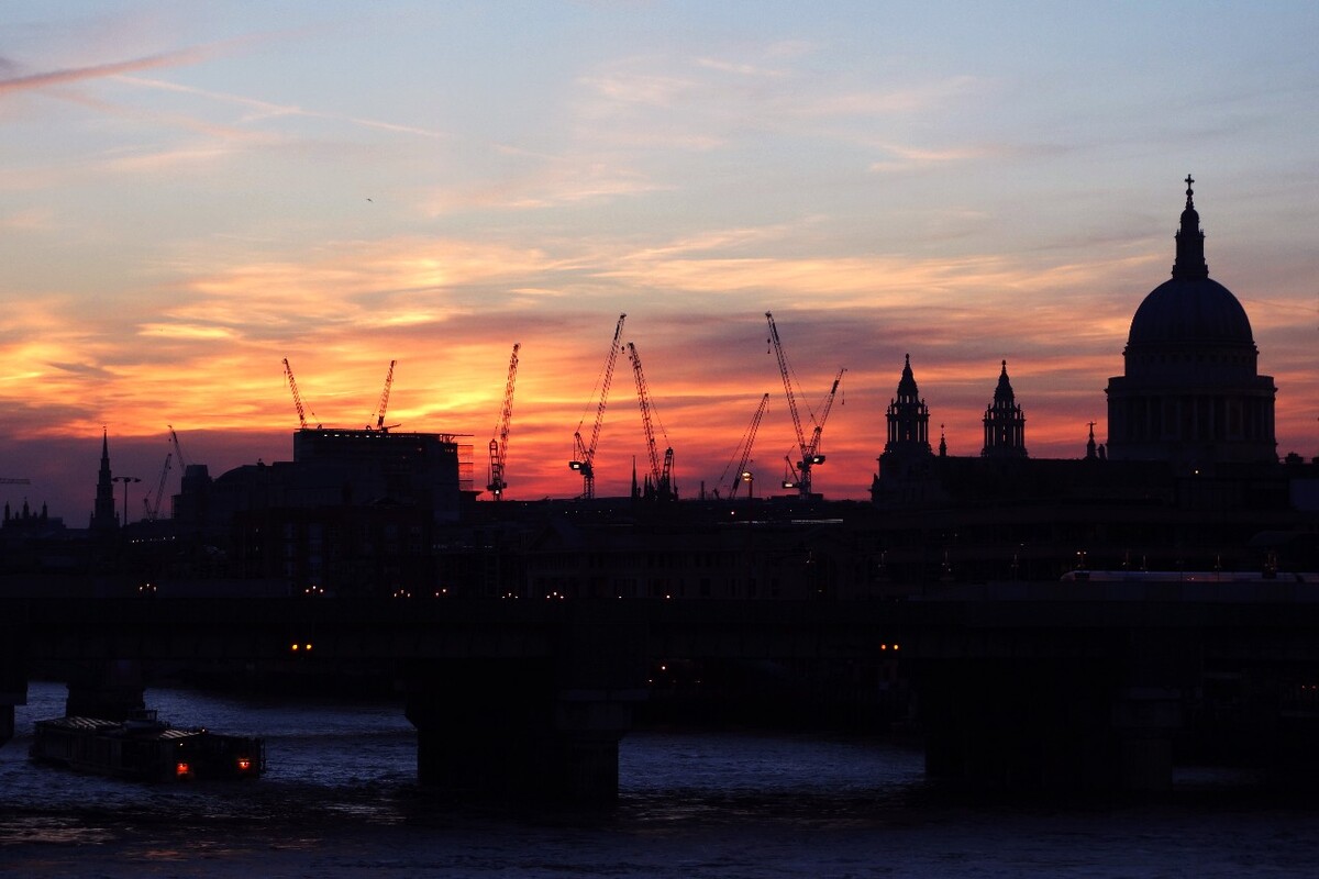 Watching sunset when walking along the London Bridge