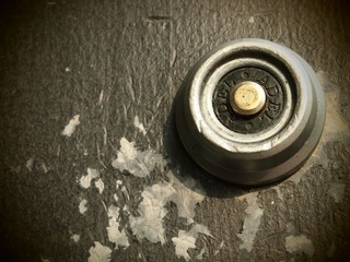 Button on a Nameless Wall.