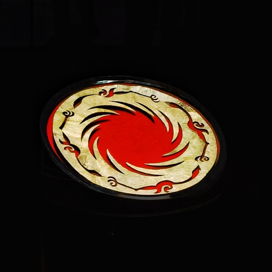 《太阳神鸟设计中"重复"运用之我见》 在成都金沙堆遗址出土的太阳