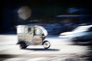摩的