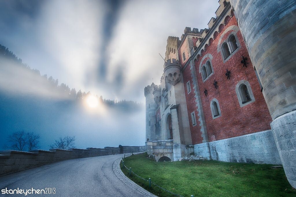 Foggy Schloss Neuschwanstein. I love the feeling approaching the castle with the fog around me all the way. It's a lot fun in watching the Tyndall effect.  see also in 500px: <a href="http://500px.com/chenxistanley" target="_blank" rel="nofollow">http://500px.com/chenxistanley</a>