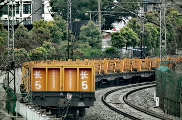 398097