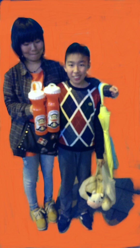 with her small brother (oh forgot it..