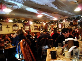 People in Julian Cafe (by runner)