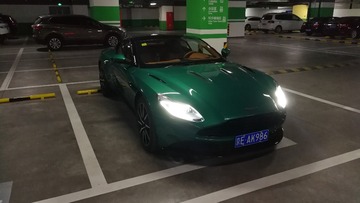 54077