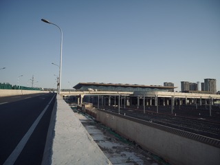 56053