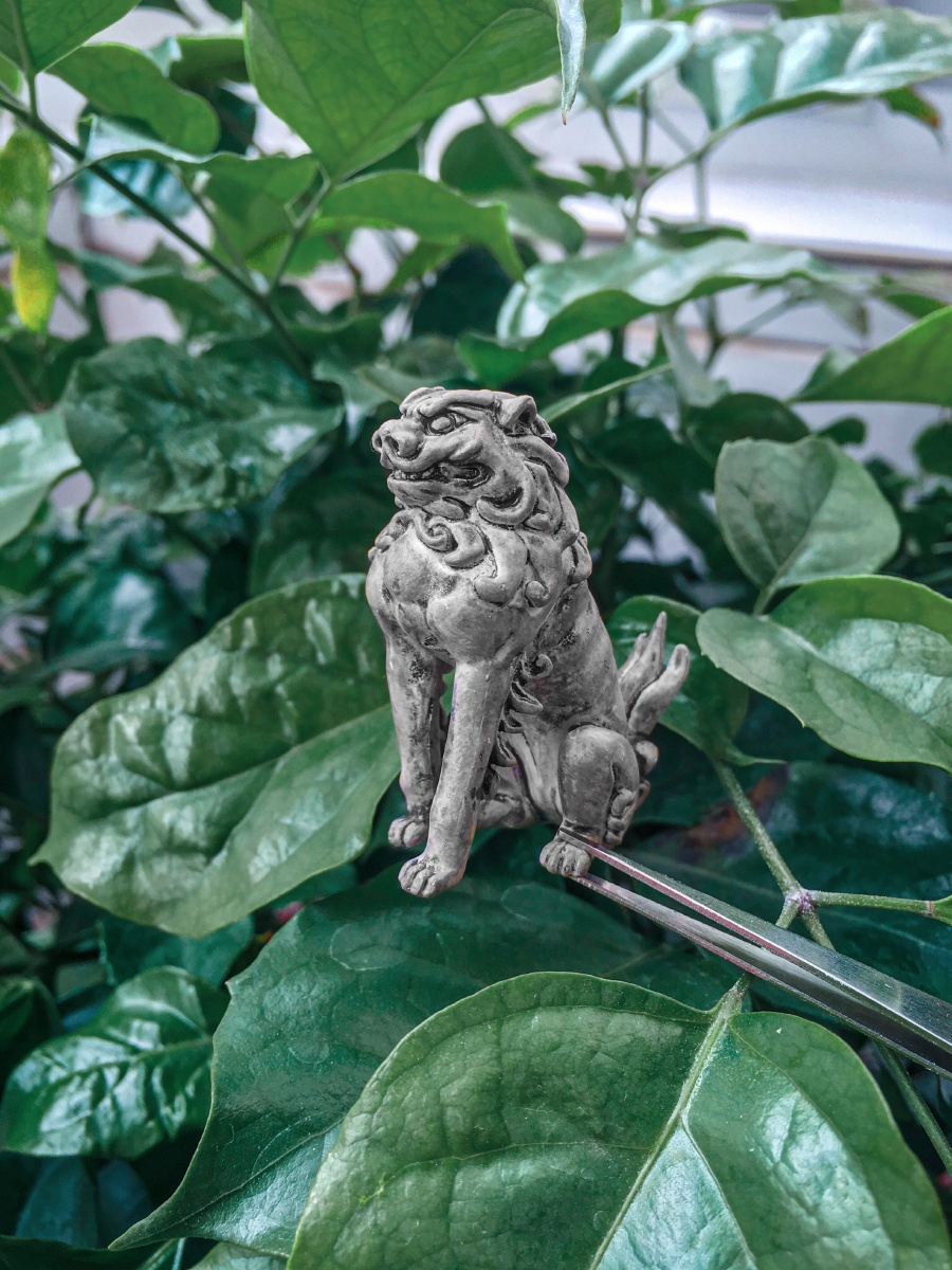 石狮子是中华传统文化的辟邪物品是镇宅瑞兽在日本被称为狛犬