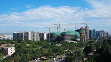 Galaxy Soho under clear blue sky Beijing 蓝天白云下的北京银河SOHO