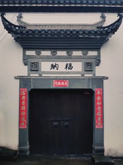 77037