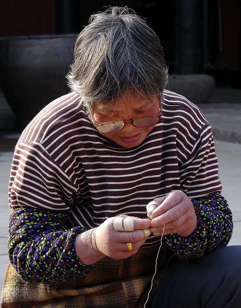 慈母手中线,临行密密缝