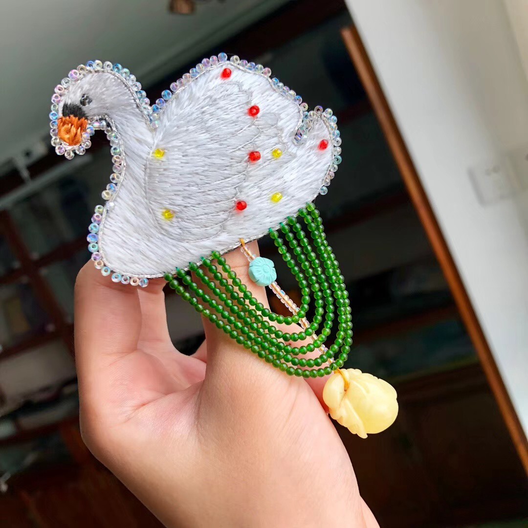 怎么做小鸟日用品手工制作,彩色方形纸折叠小鸟展开你的翅膀