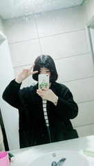 390828